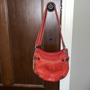 Red classic pebbled leather y2K slouchy Fossil shoulder bag purse with key charm